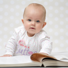 baby reading a book