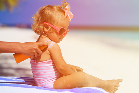 toddler girl on beach