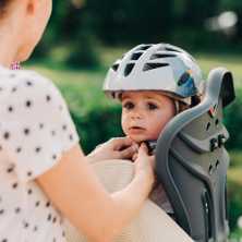 Mum cycling with baby in tow 222