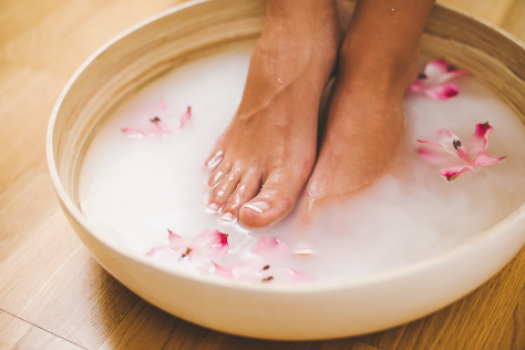 Pregnant woman soaking feet