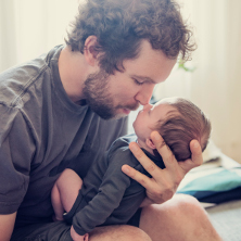 dad holding newborn 222