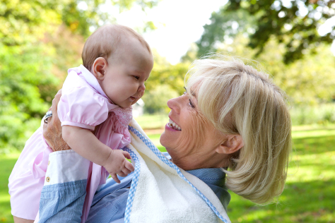 Grandmother holding baby