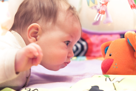 Baby with toy