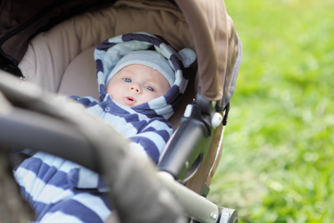 11 week old baby in pram in the park