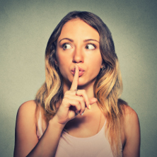 Woman hand over lips