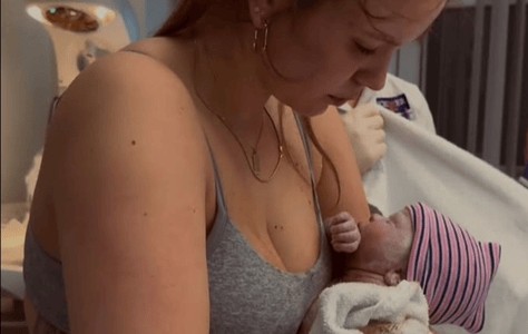 Georgia Scholes and her new baby