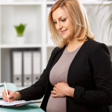 Pregnant woman discussing maternity leave