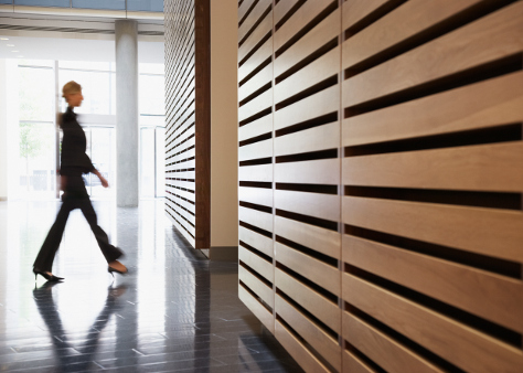 Mum walking through office