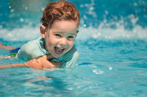 Toddler boy in pool