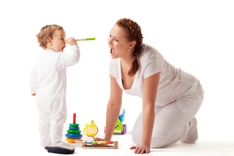 mum and baby playing with toys